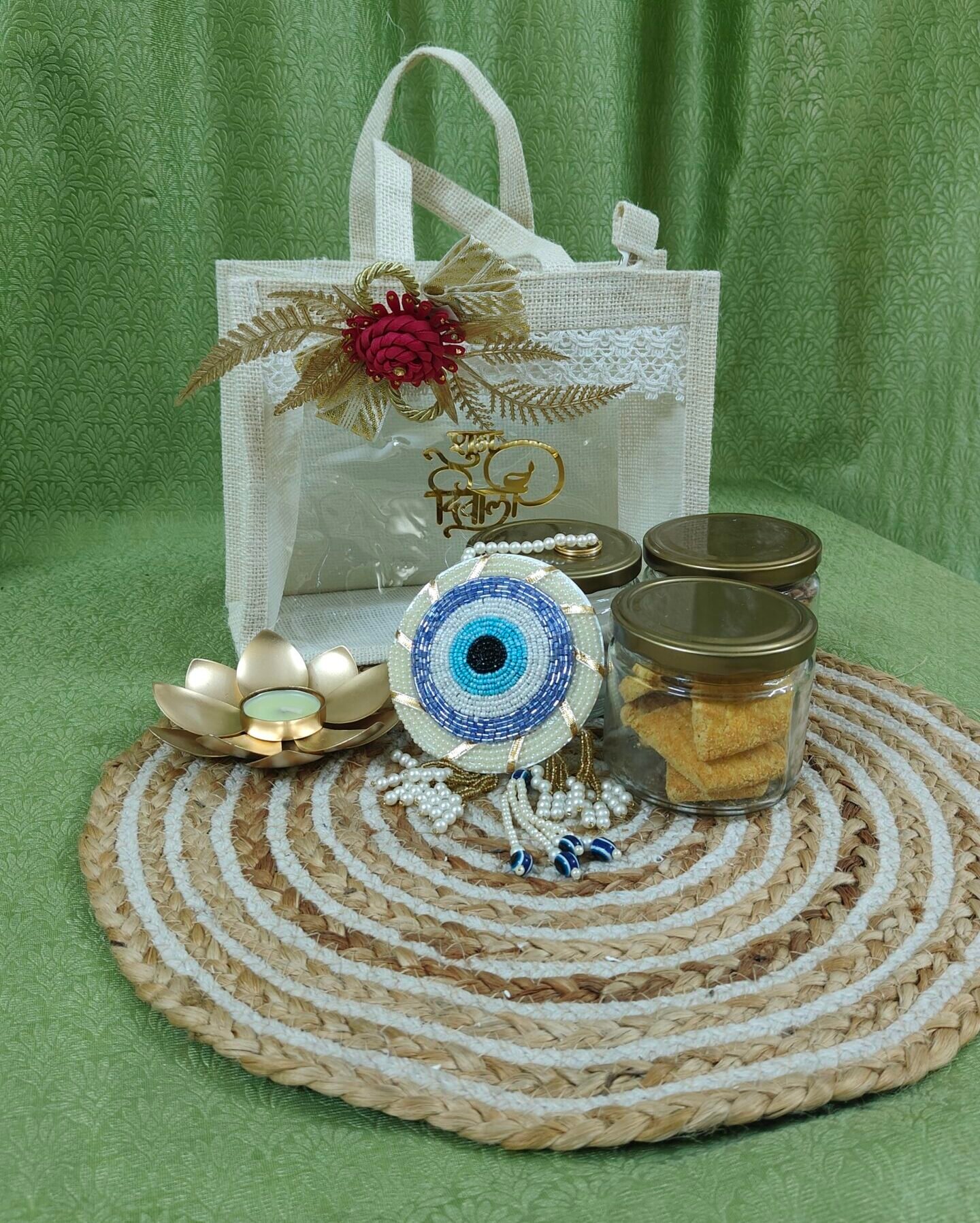 DGHamper - 102 | Red Rose Diwali Gift Hamper with Lotus Candle & Evil Eye Charm | Blessico